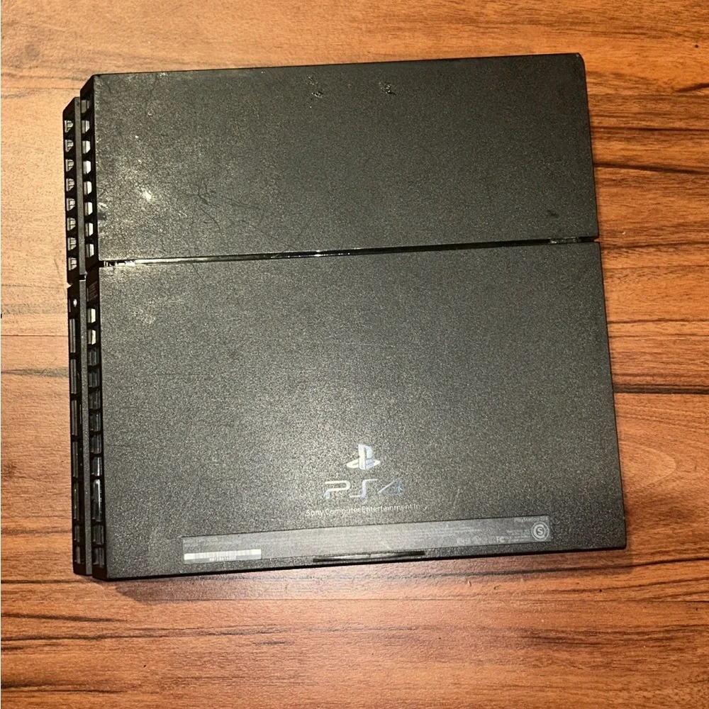 PS4 500GB Console Bundle - 4 Games Included (No Controller) – Works Great